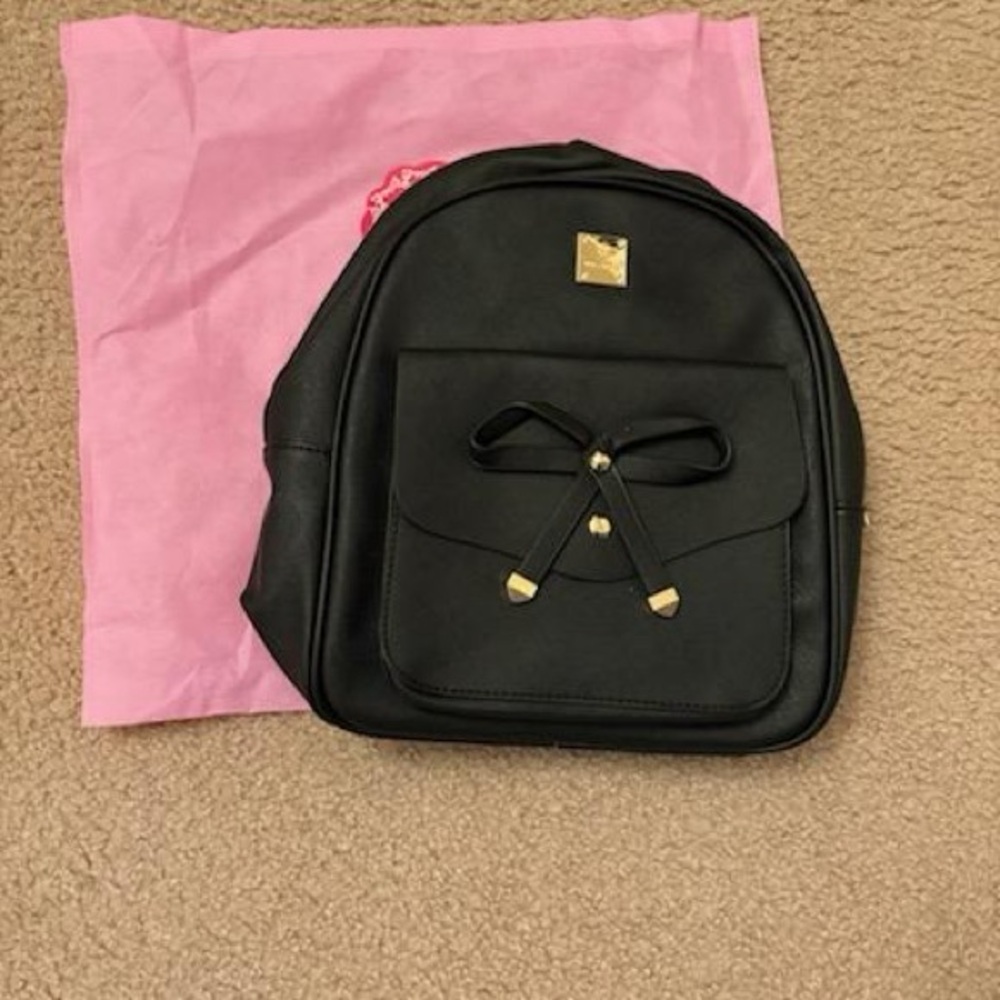 Elegant Black Backpack with Gold Bow Accent | Matching Wallet & Cosmetic Pouch